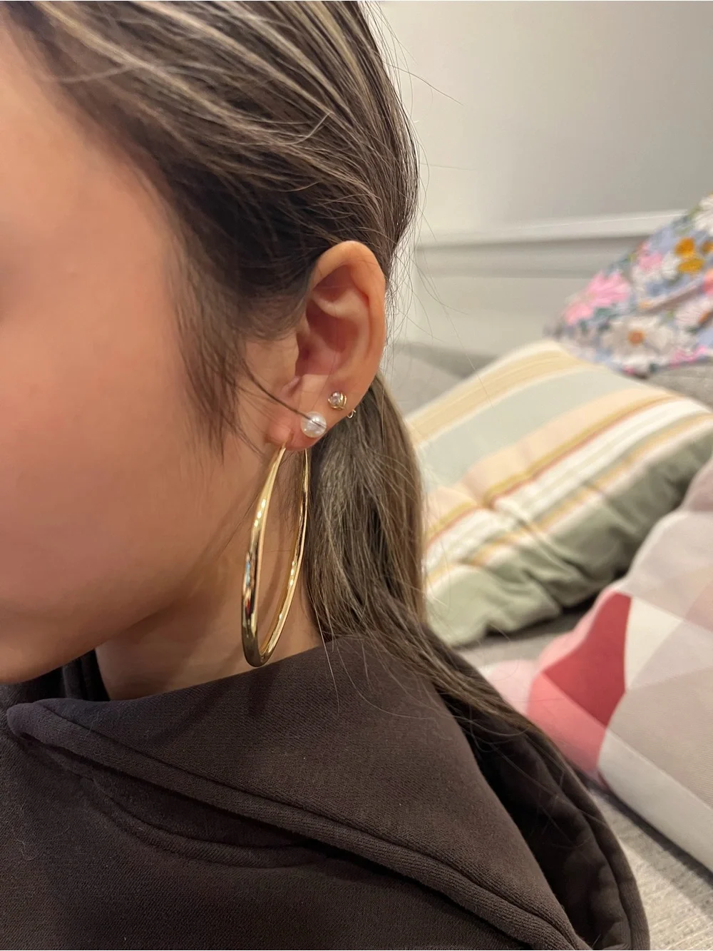 70mm gold-tone hoop earrings.